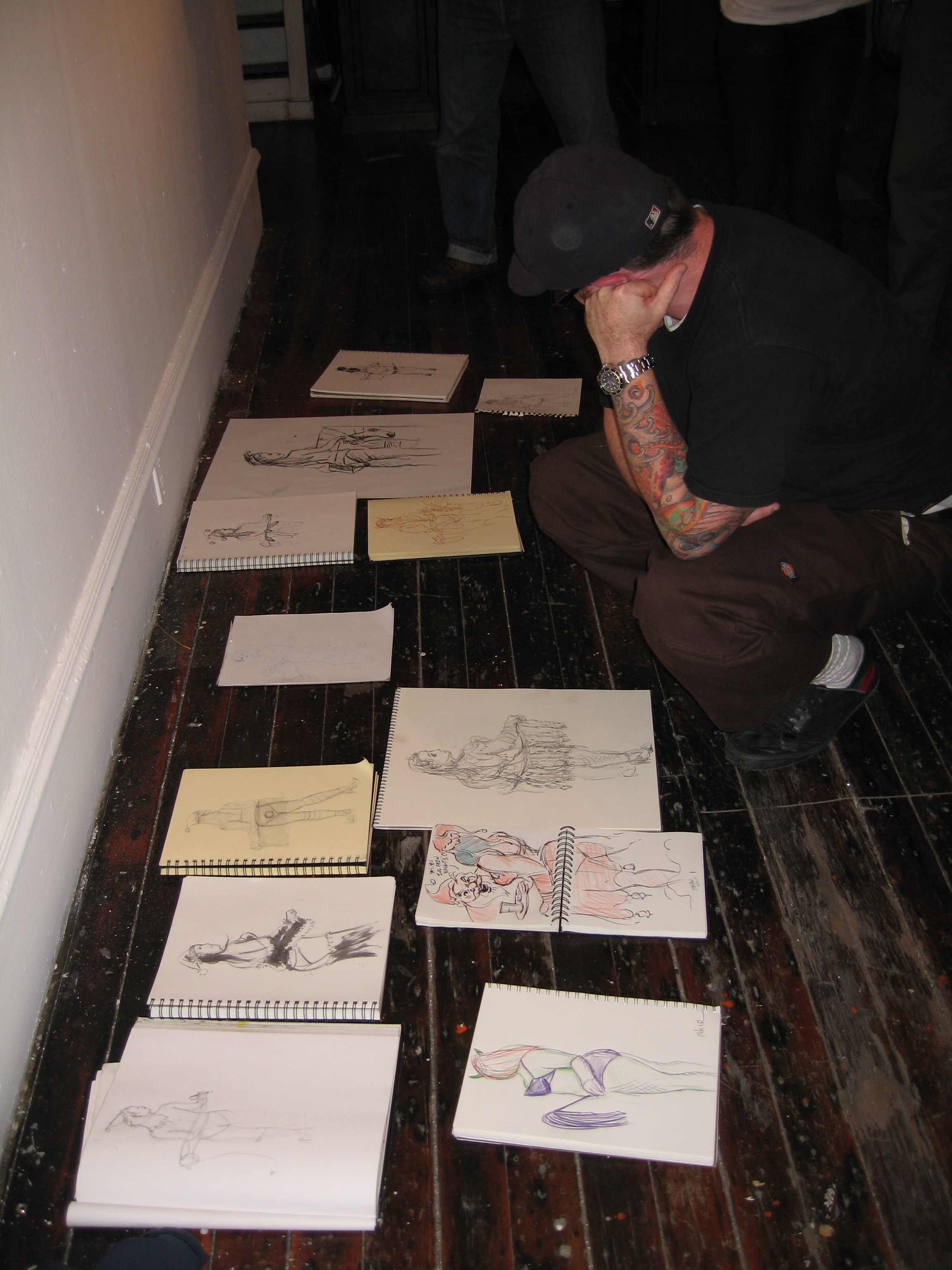 justin reviewing dr. sketchy's work